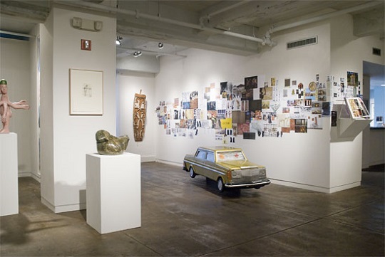 Magiciens de la Terre, installation with Coffin Car by Kane Kwei. Photo courtesy of Fleisher-Ollman Gallery..jpg